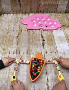 Looking for a fun Spring or Easter activity for an Easter Party or just a fun activity at home? Check out this Jelly Bean Catapult activity where the kids build their own catapults and launch the classic Easter candy! To make it extra fun, add point values and target practice! It's a great #STEM activity that ends with sweets!